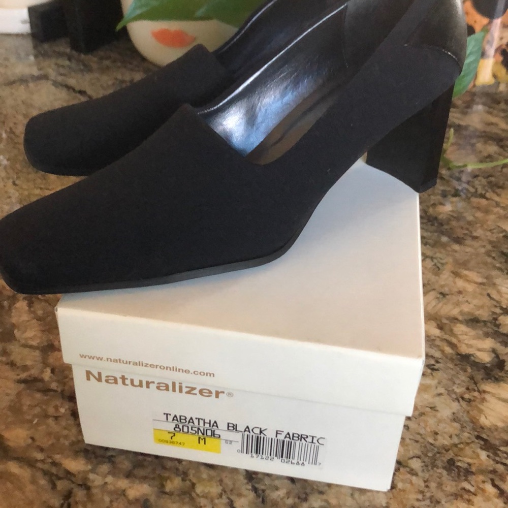 New in box—Naturalizer women’s black fabric pumps.